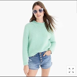 High-rise denim short with exposed button fly